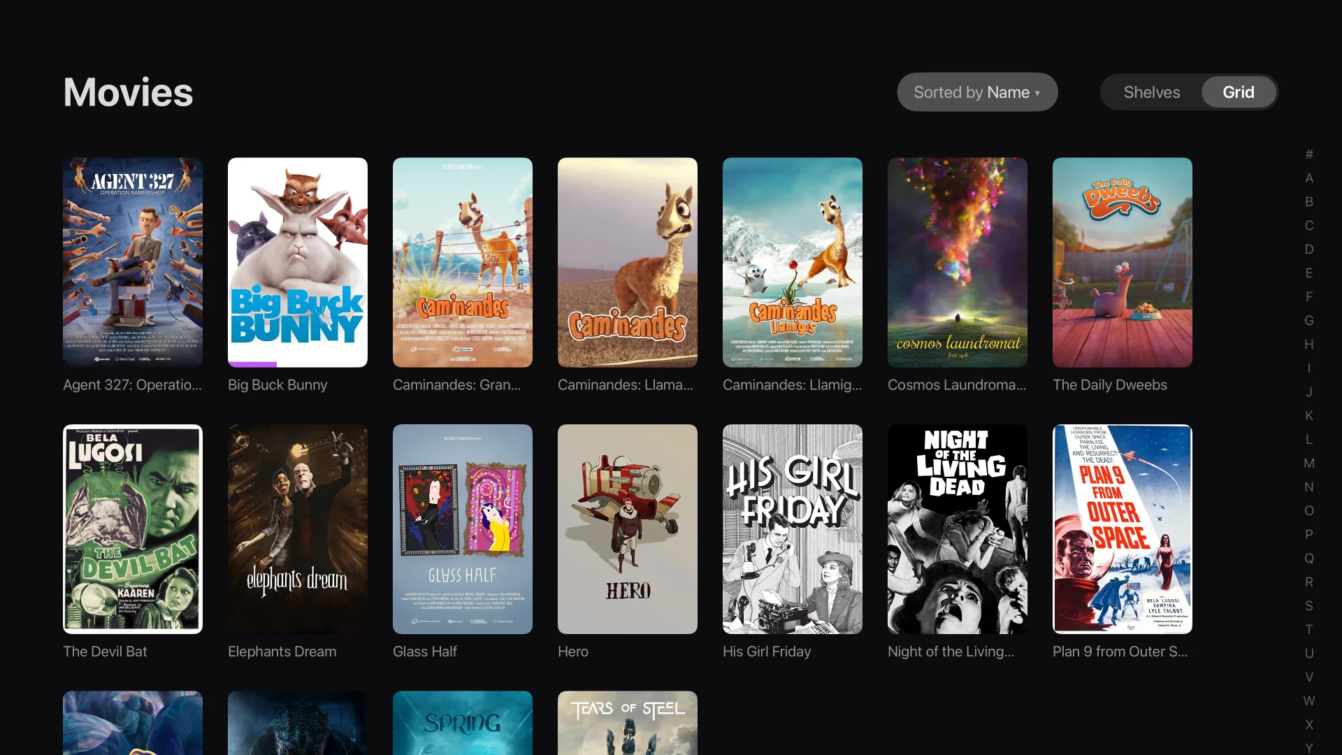 Movies library as a poster grid with sort control and A–Z rail
